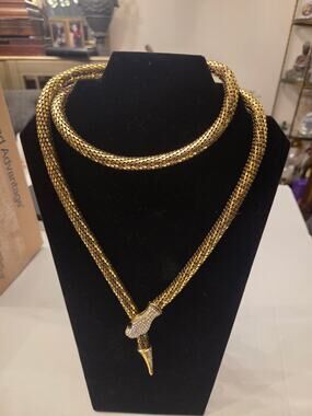 Snake lariat necklace or belt. 
Pave/rhinestones head and tail.